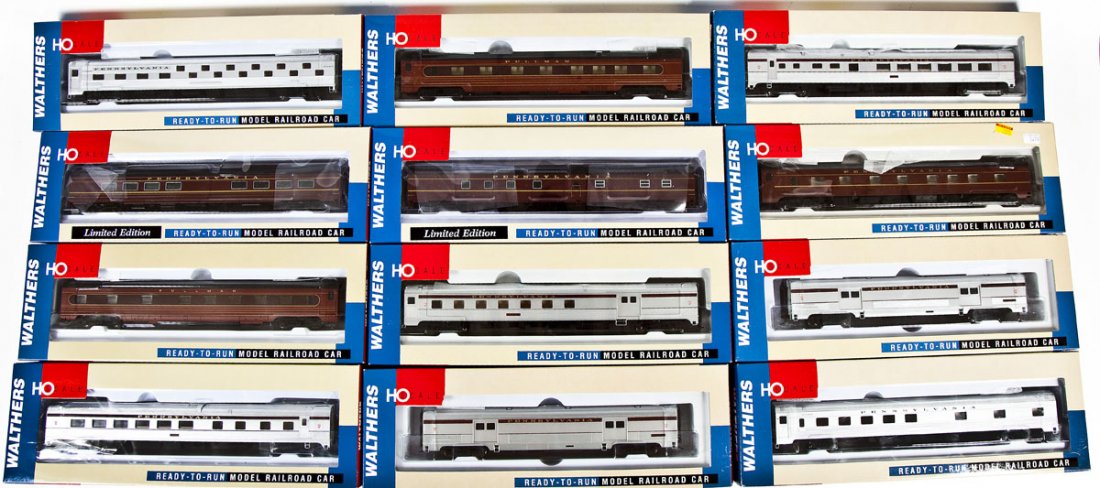 12 Walters PRR Passenger Cars: DESCRIPTION: Twelve Walthers PRR passenger cars. HO scale. CONDITION: Appear unused in original boxes.