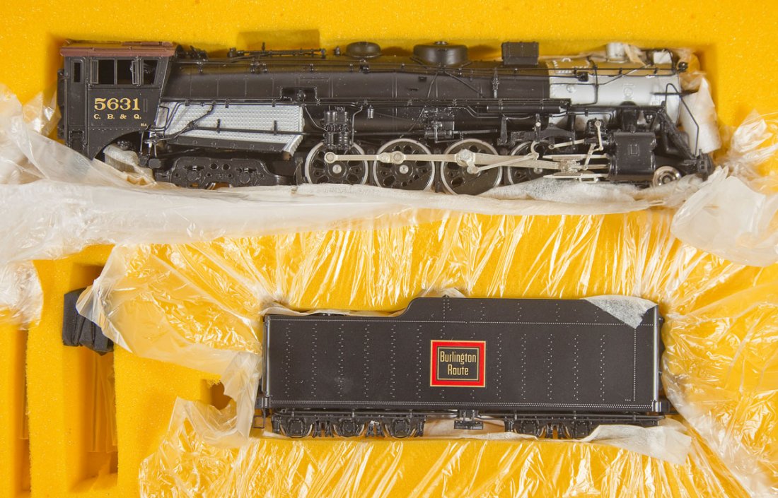 Oriental Ltd Burlington Closed Cab Coal Brass Loco: DESCRIPTION: Oriental Limited Burlington Closed Cab Coal painted brass locomotive and tender. HO scale. CONDITION: Appears unused in original box with paperwork.