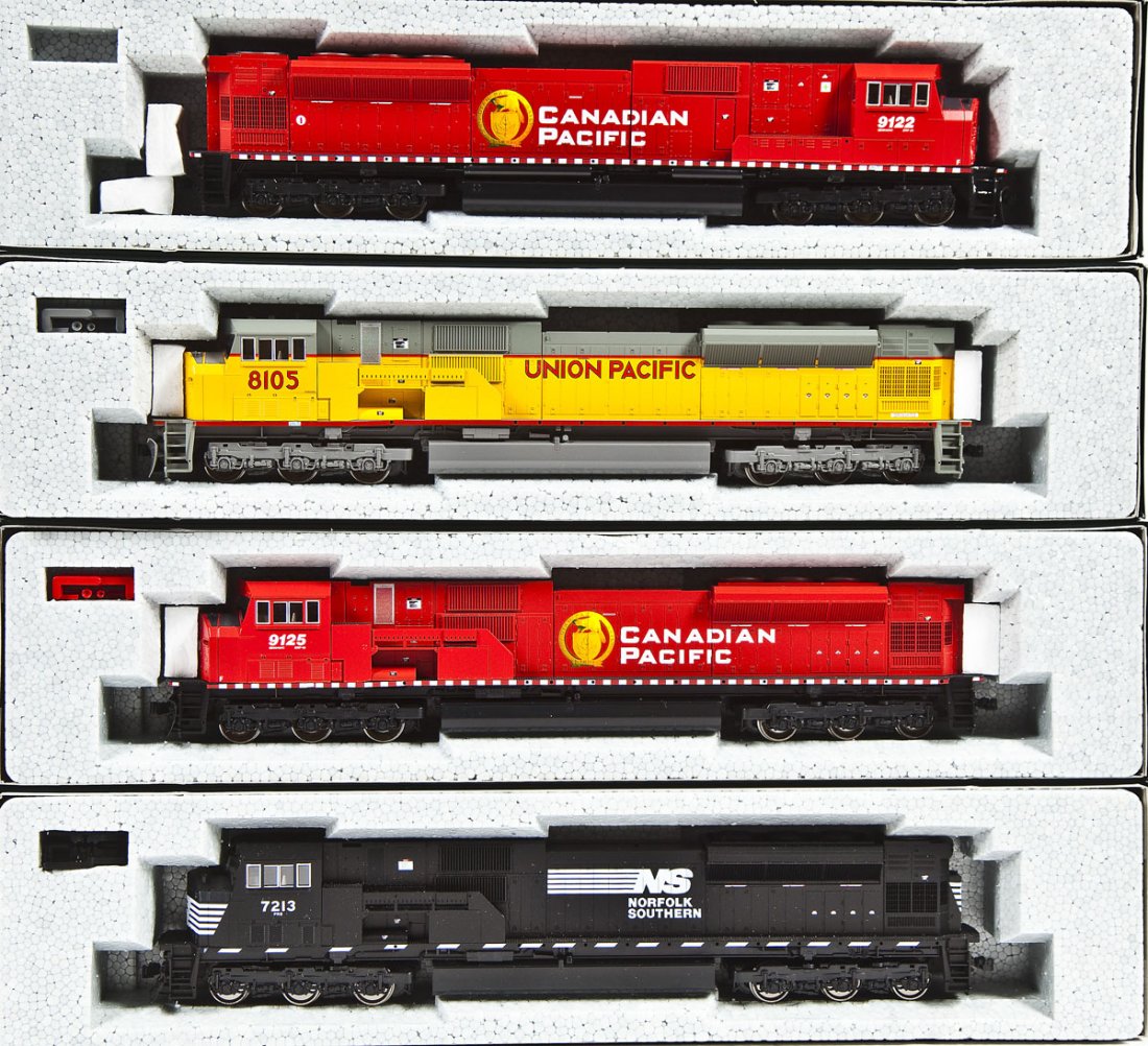 4 Kato HO Locomotives: DESCRIPTION: Four Kato locomotives including NS #7213, CP #9125, UP #8105 and CP #9122. HO scale. CONDITION: Appear unused in original boxes.