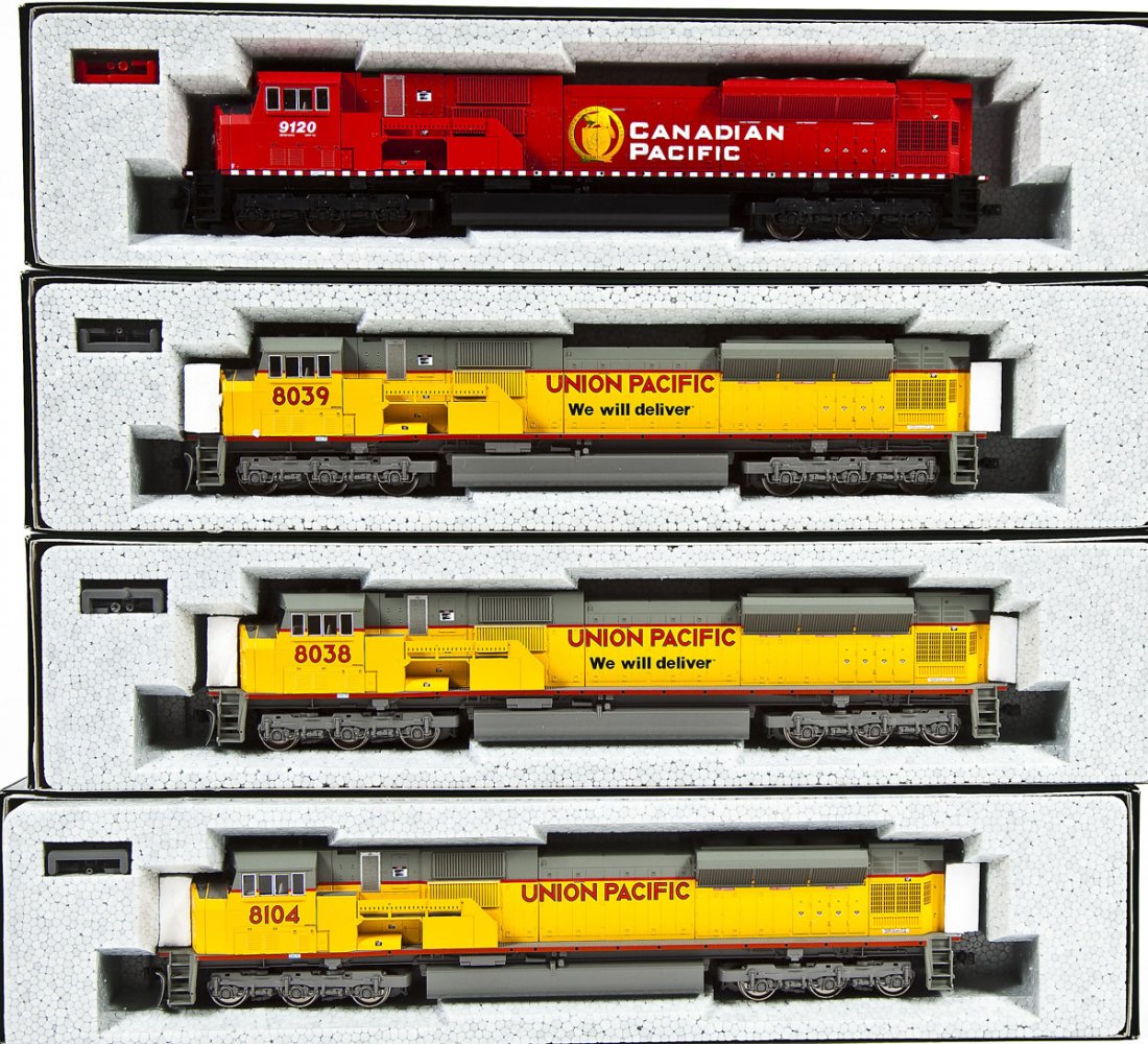 4 Kato HO Locomotives: DESCRIPTION: Four Kato locomotives including UP #8104, CP #9120, UP #8038 and UP #8039. HO scale. CONDITION: Appear unused in original boxes.