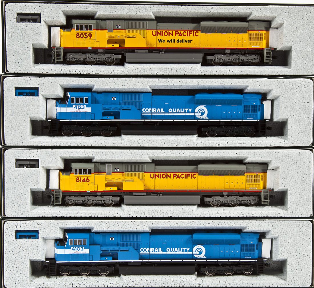 4 Kato HO Locomotives: DESCRIPTION: Four Kato locomotives including Conrail #41023, UP #8146, Conrail #4123, and UP #8059. HO scale. CONDITION: Appear unused in original boxes.