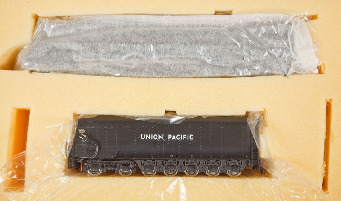 Key Imports UP FEF-3 Coal #843 Brass Loco & Tender: DESCRIPTION: Key Imports UP FEF-3 Coal #843 painted brass locomotive and tender. HO scale. CONDITION: Appear unused in original box with paperwork.