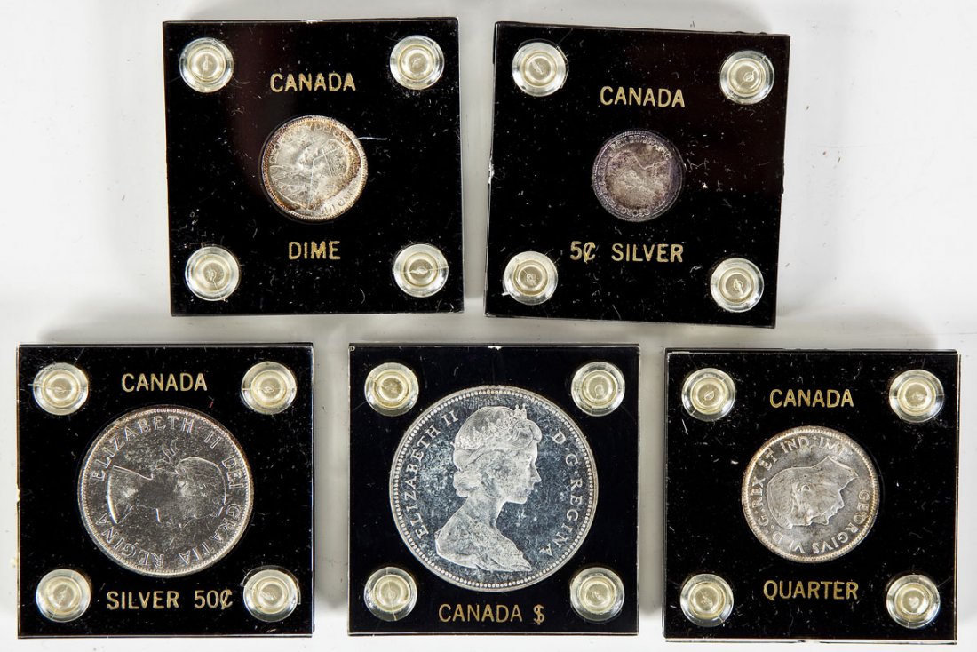 5 High Grade Canadian Silver Coins: DESCRIPTION: Group of five high grade Canadian silver coins. Includes 1965 dollar, 1954 half dollar, 1940 quarter, 1936 dime and 1920 5 cent silver. All housed in plastic cases. MEASUREMENTS: Various.