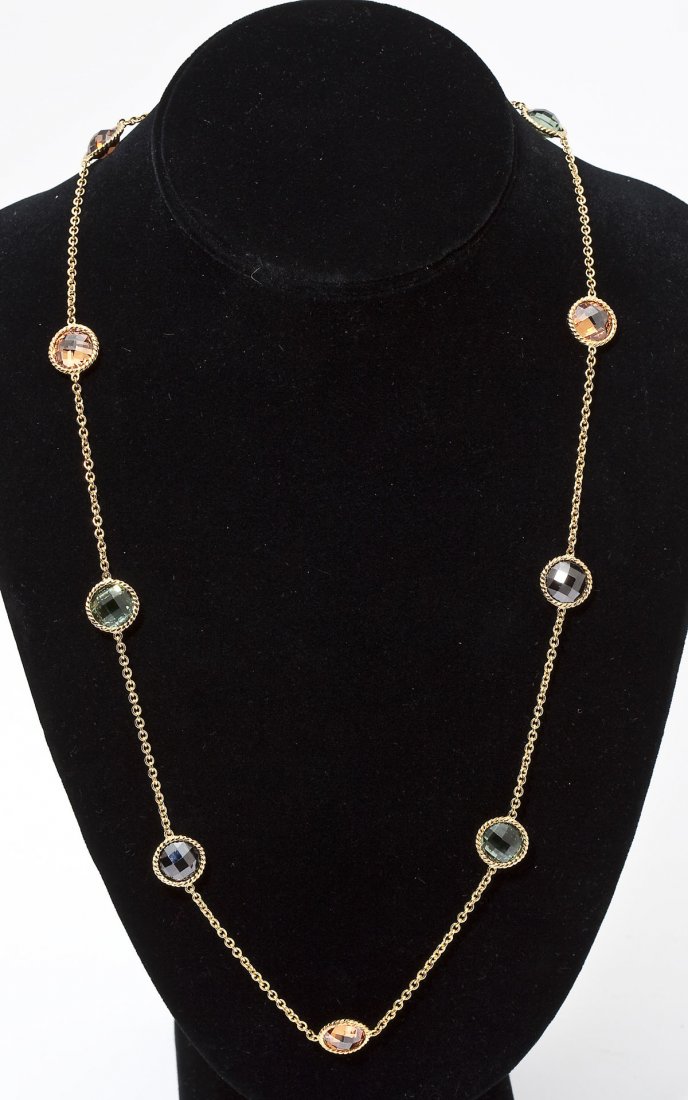 Judith Ripka Sterling Station Necklace: DESCRIPTION: Judith Ripka station necklace in marked sterling silver (925). Goldfilled and set with nine earth tone color round quartz stones. Includes original Judith Ripka box (not shown). MEASUREME