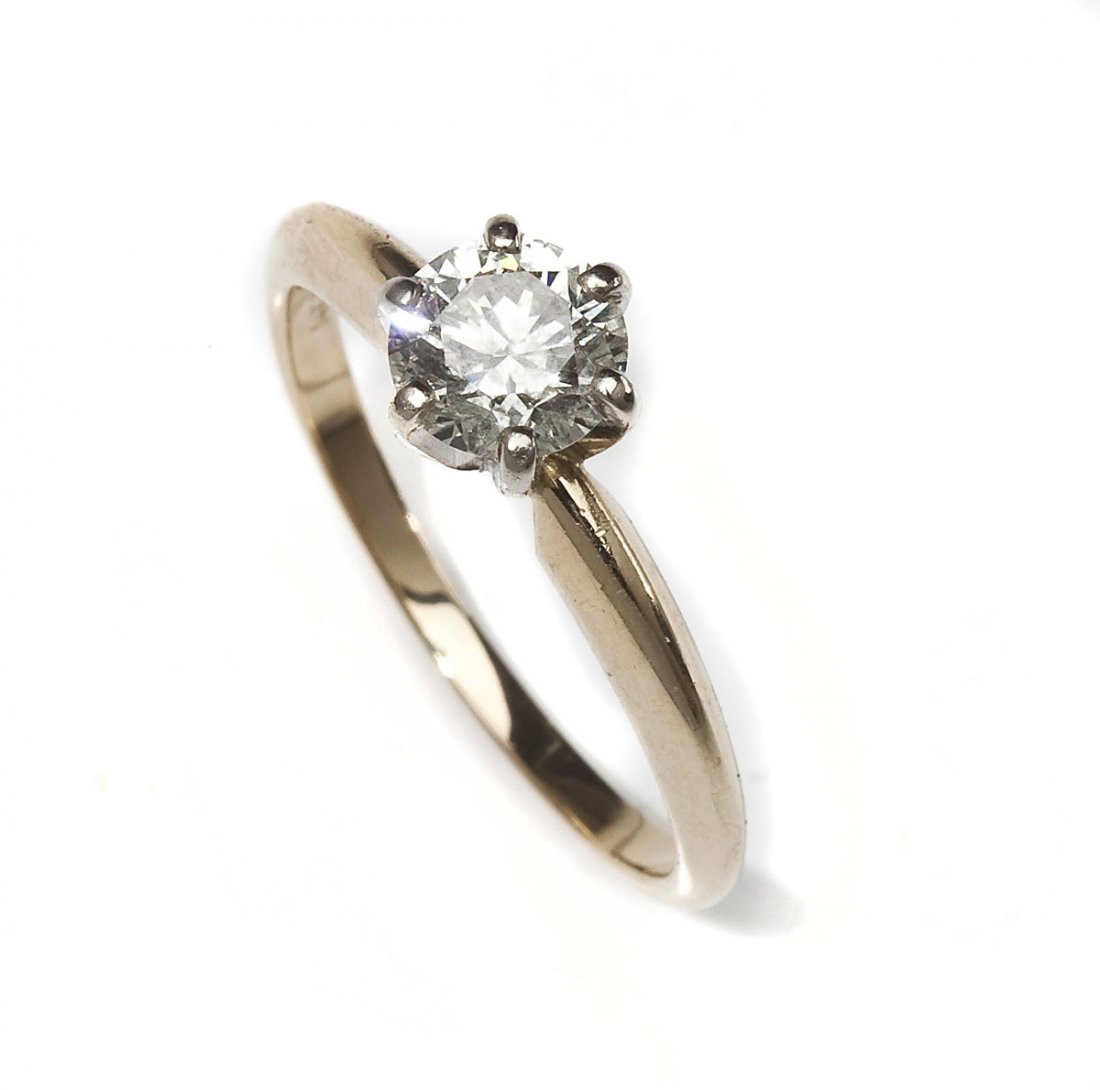 .73 Carat Diamond Solitaire: DESCRIPTION: Diamond solitiare ring in marked 14K by Stuller Settings. Set with one .73 carat round brilliant cut diamond. Clarity SI2, color H-I. MEASUREMENTS: Size 7-1/4. 1.8 dwt (2.7 gr). CONDITION