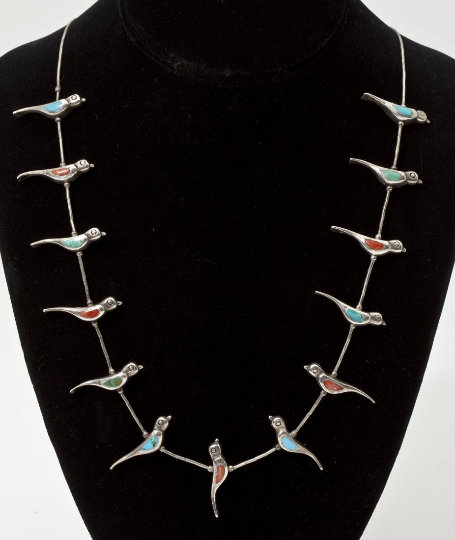 Zuni One Strand Bird Fetish Necklace: DESCRIPTION: Zuni tube bead necklace with thirteen bird fetish beads inlaid with turquoise and carnelian. Includes Certificate of Authenticity from Silver Eagle Traders, Trumbull, Connecticut. MEASURE