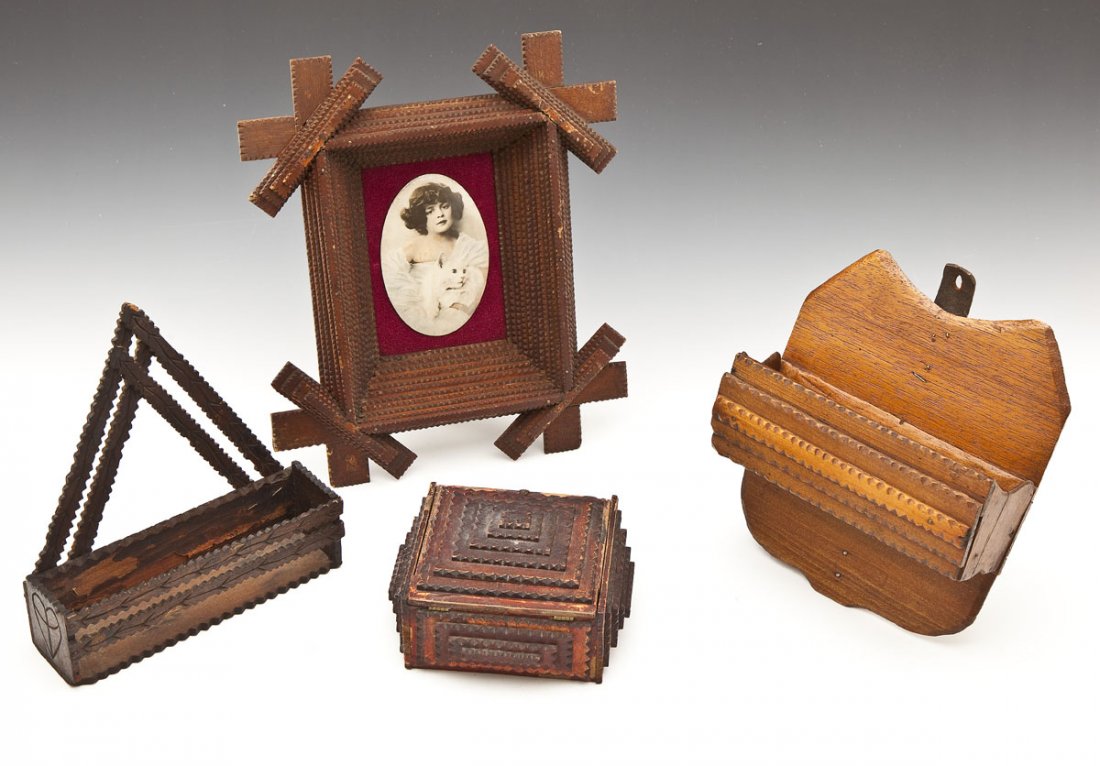 4 Pcs of Tramp Art: DESCRIPTION: Four pieces of tramp art. Includes: 1) 6-1/2" x 4" chip carved box with lift lid. 2) 8-1/4" x 9" letter holder carved with leaves and hearts. 3) 10-3/4" x 13" chipped carved deep frame wi