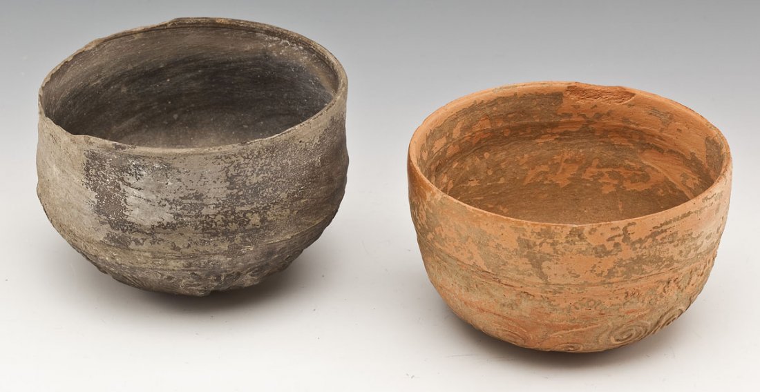 2 Hellenistic Megarian Bowls: DESCRIPTION: Two Hellenistic Megarian bowls. Includes: 1) Red-slipped bowl of hemispherical form. The base centered by a disk enclosing a rosette surrounded by scrolling beneath a dotted band. 4-3/8" 