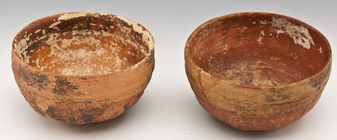 2 Hellenistic Megarian Bowls: DESCRIPTION: Two Hellenistic Megarian bowls. Includes: 1) Red-slipped bowl of hemispherical form. The base centered by a disk enclosing a rosette surrounded by graduated circles and urns beneath a pet