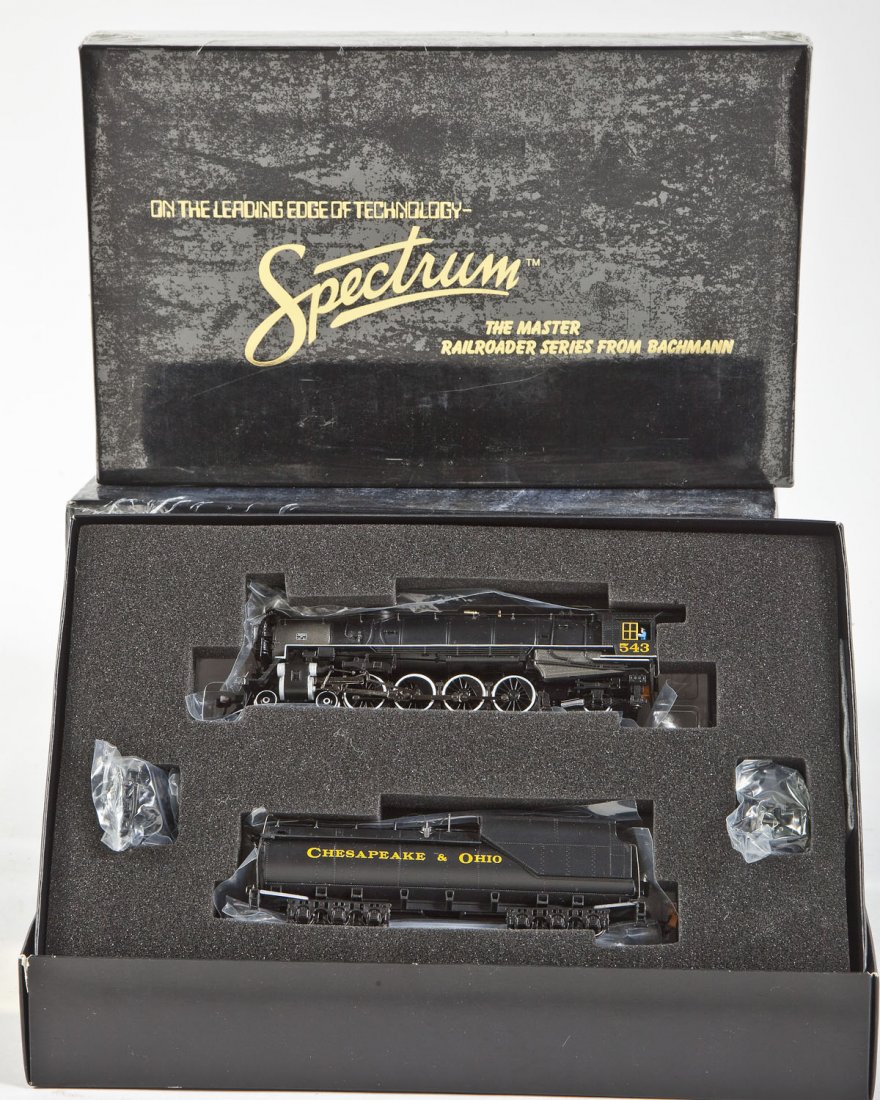 Four Bachmann Spectrum Diesel Locomotives: DESCRIPTION: Four Spectrum locomotives including PRR #1361, C&O J2, PRR #3750, and PC #4605. CONDITION: Appear unused in original boxes.