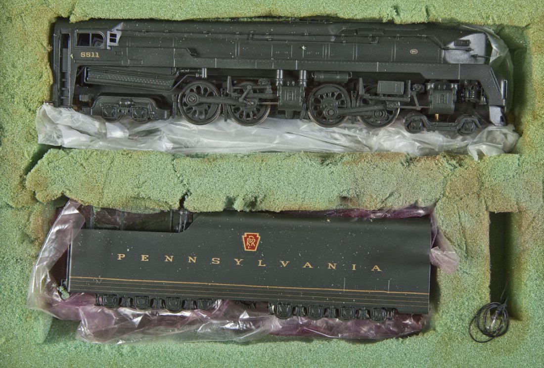 Alco Models PRR T-1 Brass Locomotive & Tender: DESCRIPTION: Alco Models PRR T-1 painted brass locomotive and tender. CONDITION: Appear lightly used in original box. Foam insert is disintegrating.