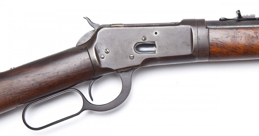 Winchester Model 53 Takedown Rifle - .25-20 Cal.: SERIAL #: 995795, Circa 1928. DESIGN: Take down lever action with half length tubular magazine. 22" round barrel. MATERIAL/FINISH COMPOSITION: Blued steel. Wood straight stock and forearm. FEATURES: B