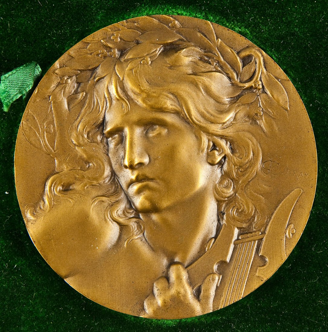 C. Loudray Bronze Medallion The Lute Player: DESCRIPTION: Bronze medallion The Lute Player by C. Loudray. Signed middle right "C. Loudray". Verso of an angel with trumpet and violin. House in original case. MEASUREMENTS: 2-3/4" diameter. CONDITI