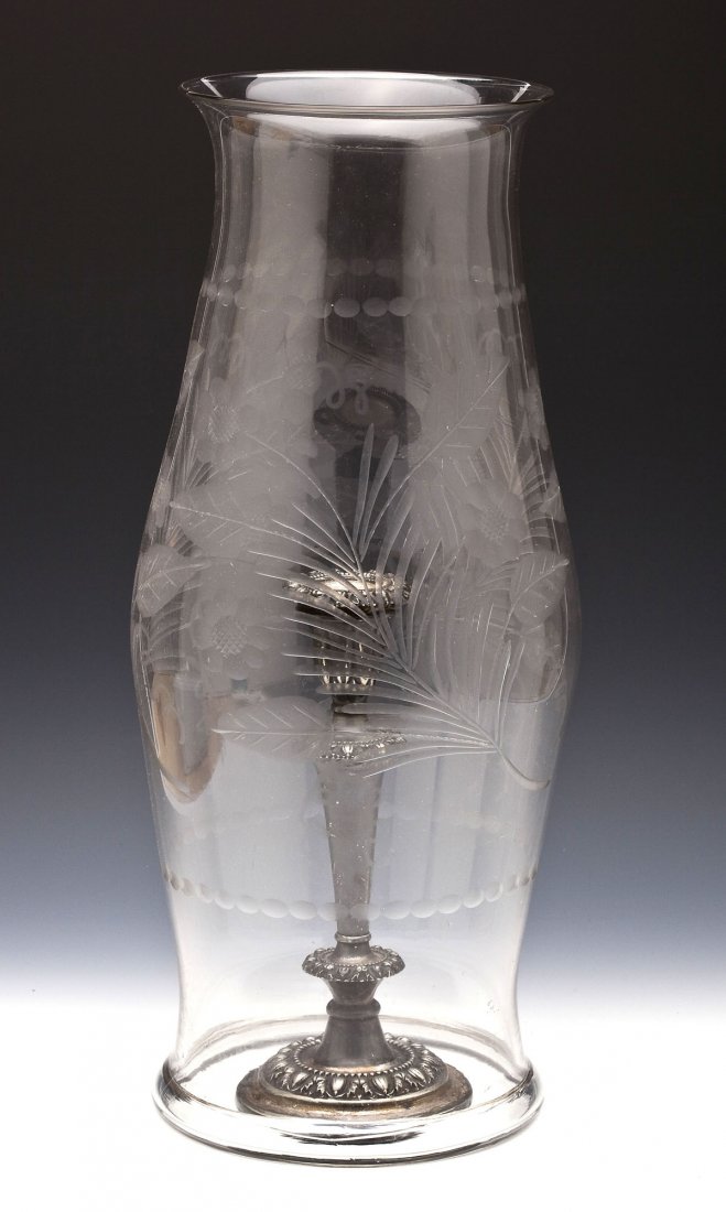 Silver Plated Candlestick & Etched Hurricane Shade: DESCRIPTION: Silver plated candlestick with a large blown glass hurricane shade of baluster form with rolled bottom edge and etched design of flowers and foliage. 19th century. MEASUREMENTS: Shade 8-1