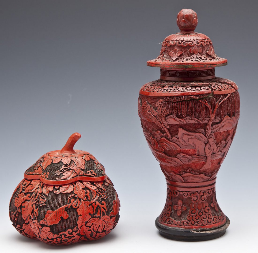 Chinese Cinnabar Gourd Box & Urn: DESCRIPTION: Two pieces of Chinese cinnabar. Includes: 1) 4-1/2" x 10-1/4" high cinnabar lidded urn. Motif of flowers and scrolls with landscape scene around midsection. Qing. 2) 5" x 5" high cinnabar