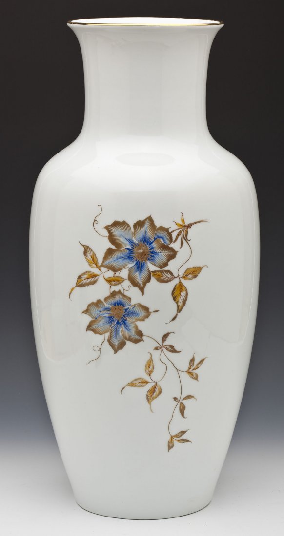 Large Kaiser Porcelain Vase: DESCRIPTION: Large German Kaiser porcelain vase. Baluster form and decorated with gold and blue flowers and foliage. Marked with blue underglaze Kaiser mark and "Dorina". MEASUREMENTS: 21-1/2" high. C