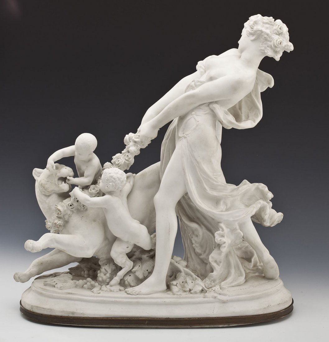 Carrier-Belleuse Porcelain Figural Group: DESCRIPTION: A parian porcelain figural group after Carrier-Belleuse. Portraying a classical woman leading a lionness with two satyr children amongst grapevines. Signed to base "Carrier Belleuse". Bas