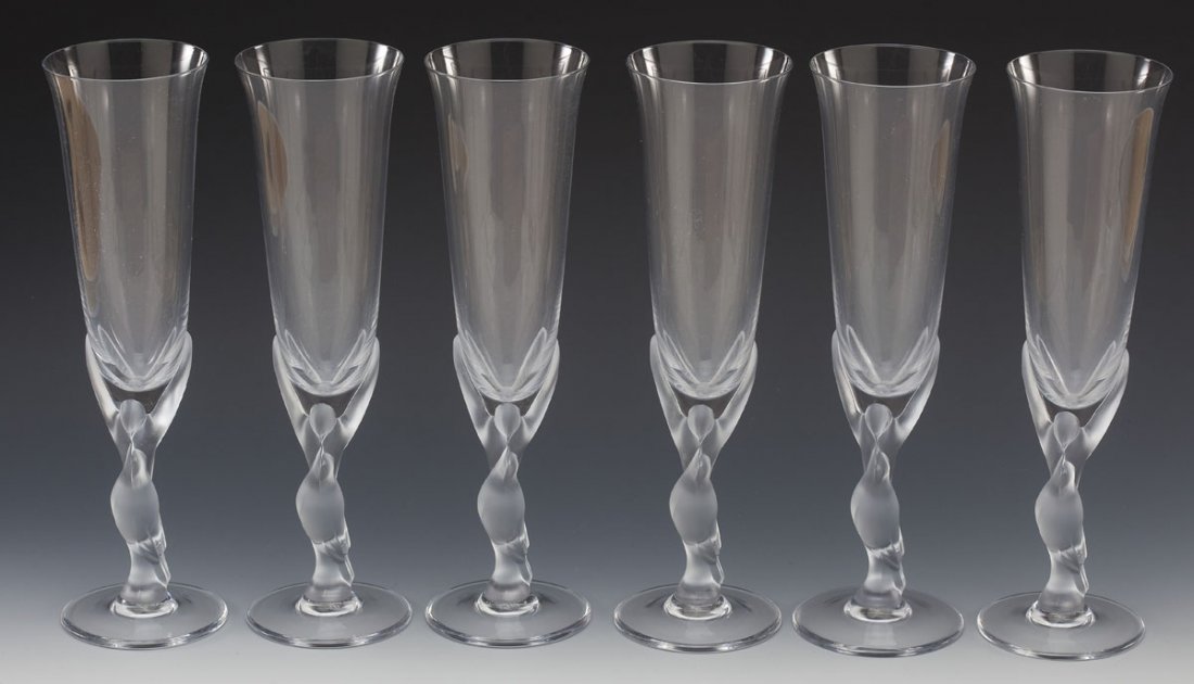 6 Faberge Kissing Doves Champagne Flutes: DESCRIPTION: Set of six Faberge Kissing Doves champagne flutes. Each marked "Egor Carl Faberge Made in France". MEASUREMENTS: 9-7/8" high. CONDITION: No defects noted.