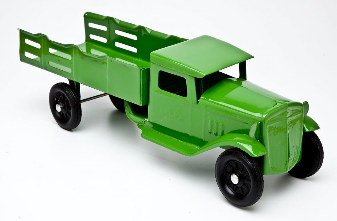Buddy L Pressed Steel Truck: DESCRIPTION: Buddy L pressed steel truck. Buddy L letters to cab doors. MEASUREMENTS: 19". CONDITION: Restored.