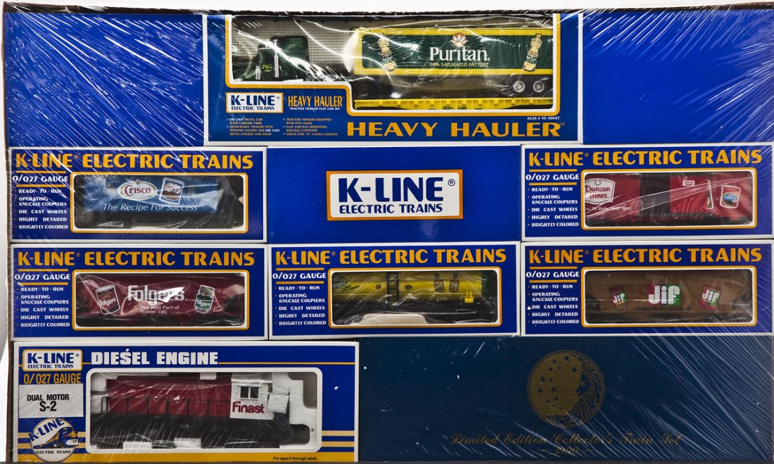 K-Line 1990 Ltd Ed Finast Train Set: DESCRIPTION: 1990 K-Line Finast limited edition collector's train set. Includes Finast dual motor S-2 diesel loco, Puritan tractor trailer flatcar, Sunny Delight tank car, Duncan Hines boxcar, Jif cov
