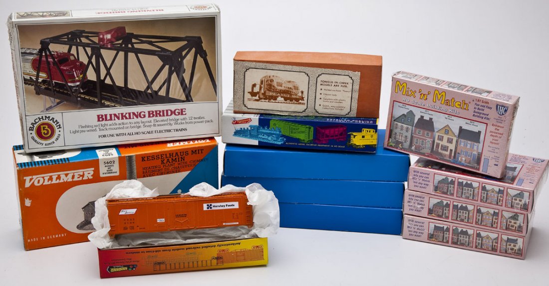 11 HO Car & Building Kits plus Walthers Peanut Car: DESCRIPTION: Eleven car and building kits including Vollmer, Roundhouse, IHC, E&C Shops, Bachmann plus a Walthers "Peanut Car". MEASUREMENTS: HO scale. CONDITION: Unused in original boxes. Peanut Car 