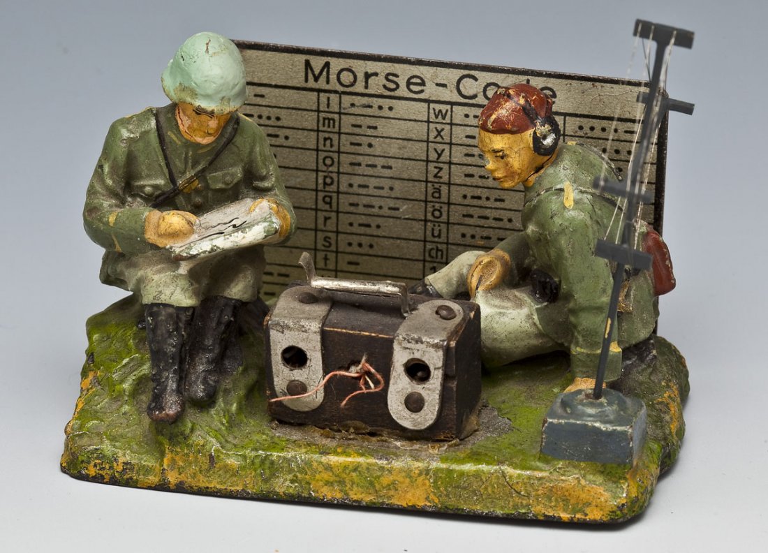 Elastolin Morse Code Telegraph Duplex Figure: DESCRIPTION: Elastolin Morse Code Telegraph duplex figure. Two German composition signal corps toy soldiers operating a morse code wireless transmitter. Rare, circa late 1930's Germany. MEASUREMENTS: 