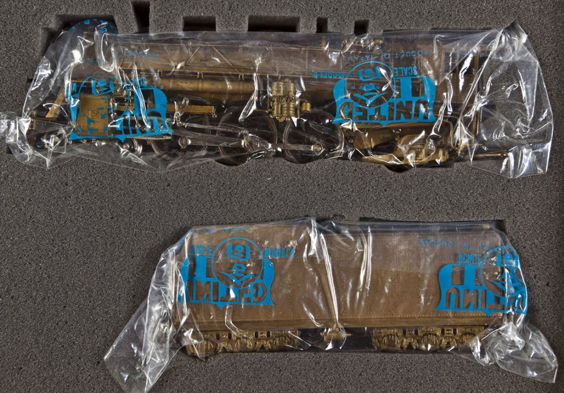 Atlas/United Scale C&NW E-2 Brass Loco & Tender: DESCRIPTION: United Scale Models C&NW E-2 brass locomotive and tender. Made by Atlas. CONDITION: Appears slightly, if at all, used in original box.