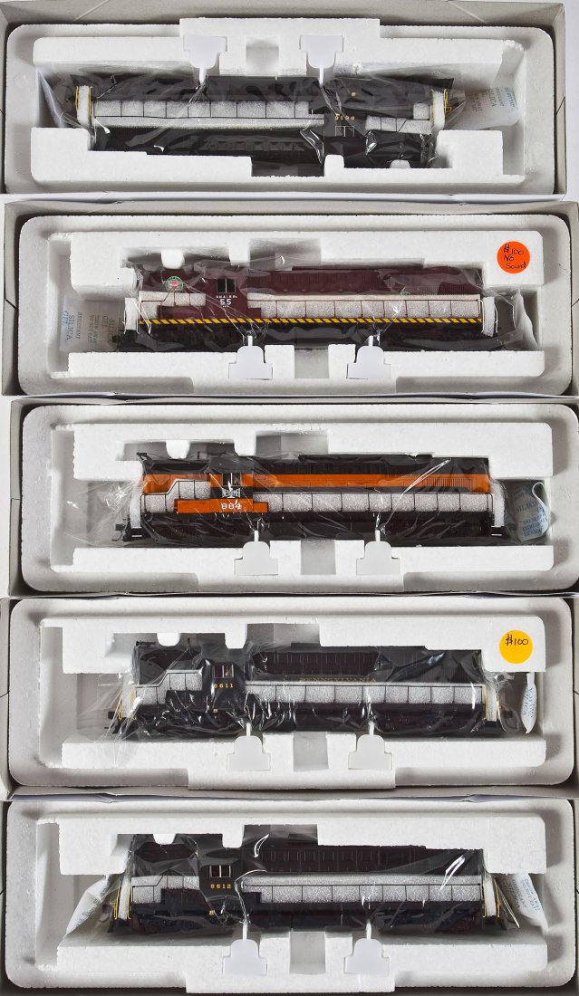 5 Broadway Limited Diesel Locomotives: DESCRIPTION: Five Broadway Limited diesel locomotives. Including: B&LE #884, DM&IR #55, and PRR #8611, #8612, and #8616. CONDITION: Appear unused in original boxes.