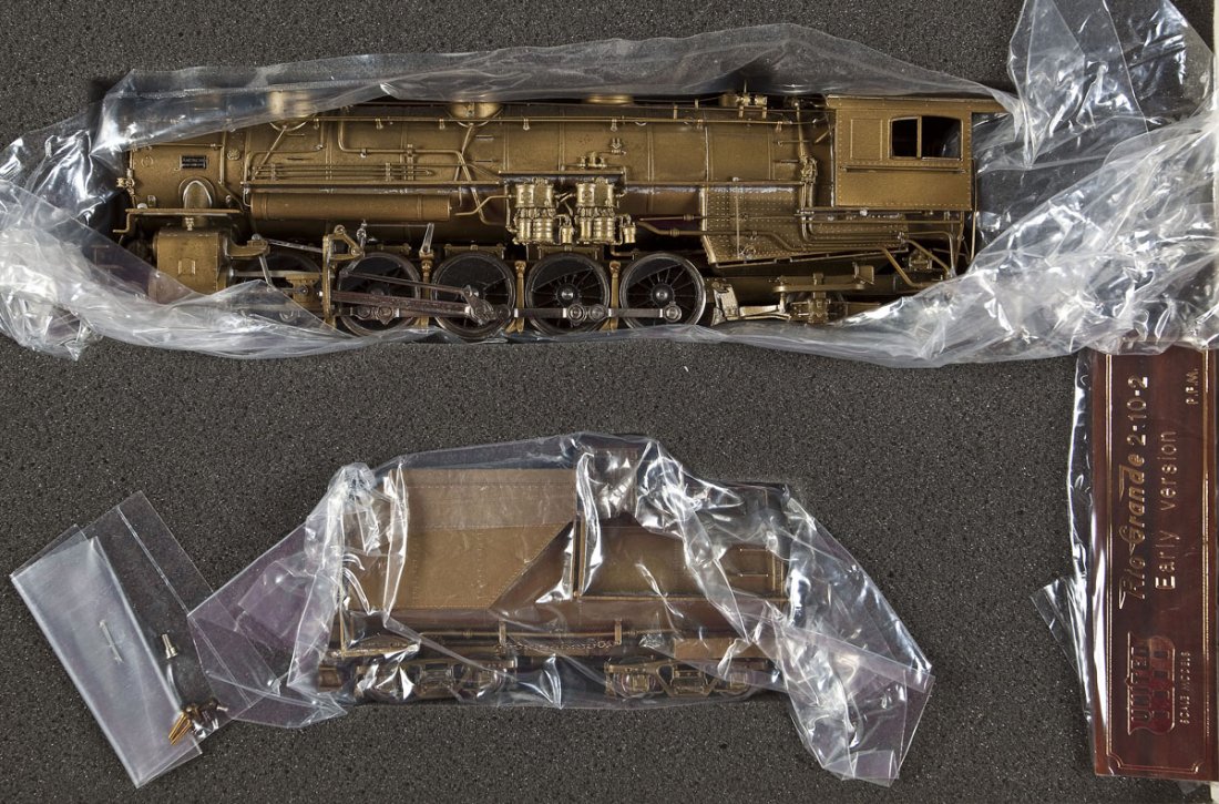 United Scale Models Rio Grande Brass Loco & Tender: DESCRIPTION: United Scale Models Rio Grande Early Version brass locomotive and tender. Made by Atlas. CONDITION: Appears slightly, if at all, used in original box.