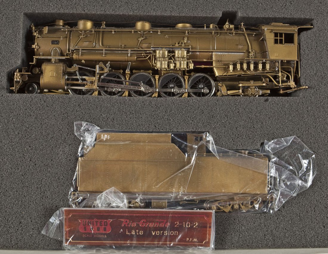 Atals/United Scale Models RG Brass Loco & Tender: DESCRIPTION: United Scale Models Rio Grande Late Version brass locomotive and tender. Made by Atlas. CONDITION: Appears slightly, if at all, used in original box.