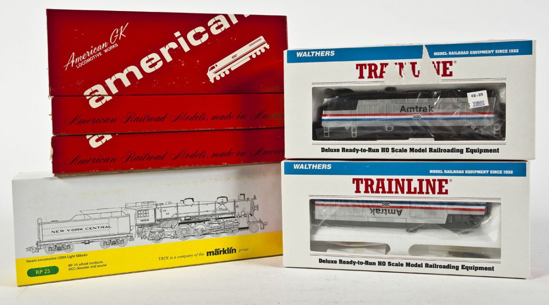6 Locomotives incl Walthers & Trix: DESCRIPTION: Six locomotives. Including: American GK Conrail #4544, PC #4502, Amtrak #972, Trix NYC Light Mikado #1890, and two Walthers Amtrak #300. CONDITION: Appear unused in original boxes.