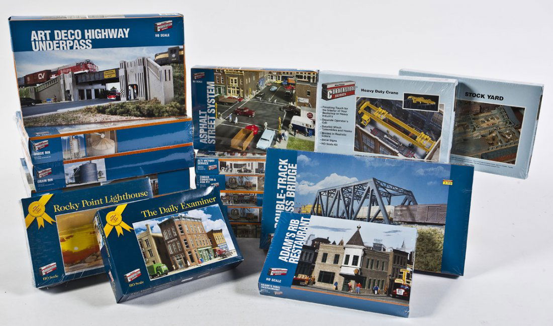 18 Walthers Cornerstone Series Building Kits: DESCRIPTION: Eighteen Walthers Cornerstone Series building kits. CONDITION: Unused in original boxes.