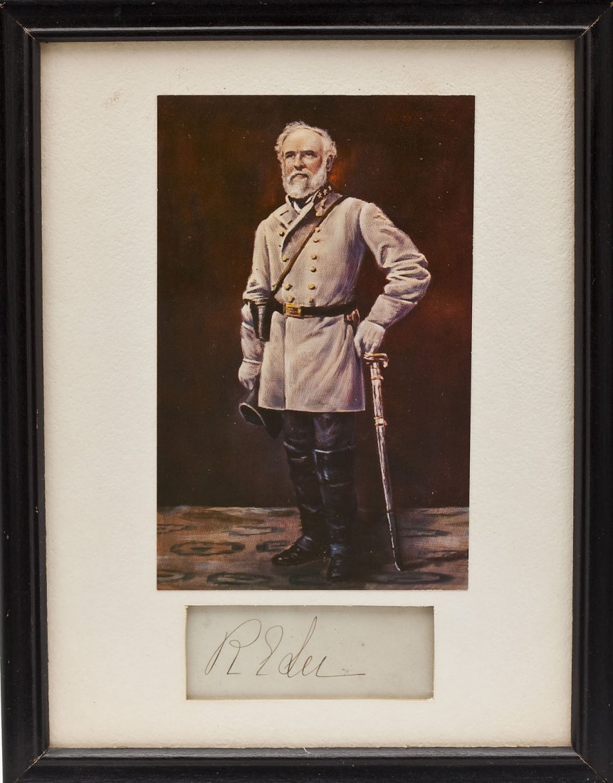 Robert E. Lee Cut Signature: DESCRIPTION: Robert E. Lee cut signature mounted beneath printed image of General Lee. Under white mounting in a black wood frame. MEASUREMENTS: Cut signature 1-1/8" x 2-3/4". Overall with frame 8-3/4