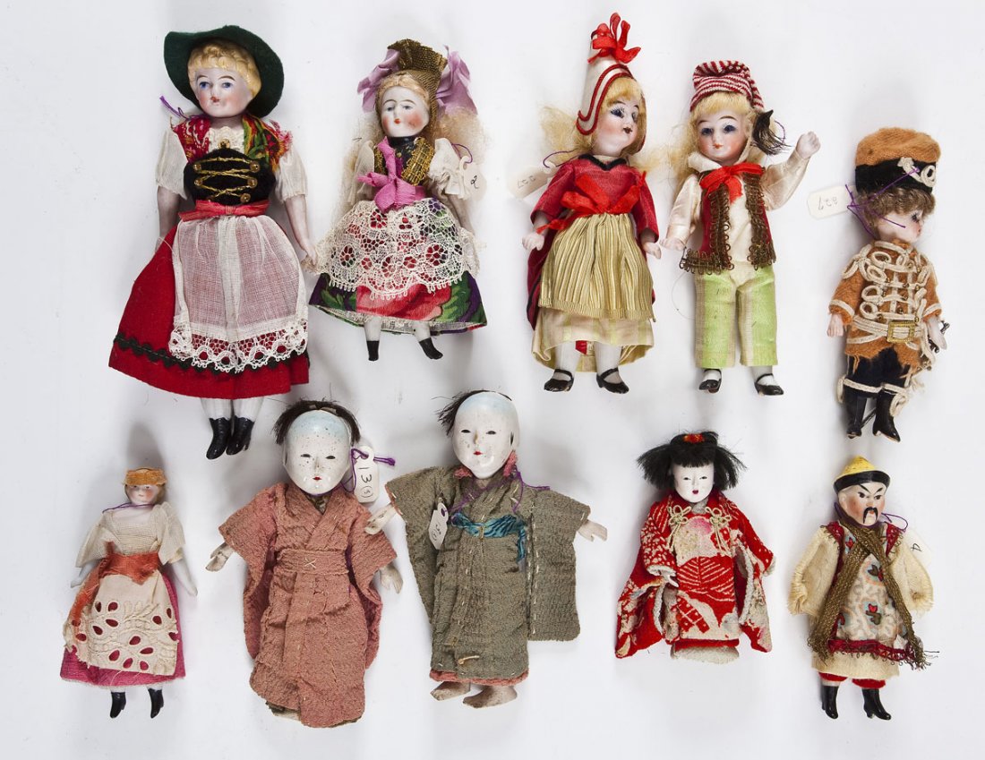 Group of 10 Miniature International Dolls: DESCRIPTION: Group of ten miniature international dolls. Six all-bisque, three composition, one parian head. Includes: Chinese, Japanese, Russian, German dress. MEASUREMENTS: Various. Range from 3-1/2