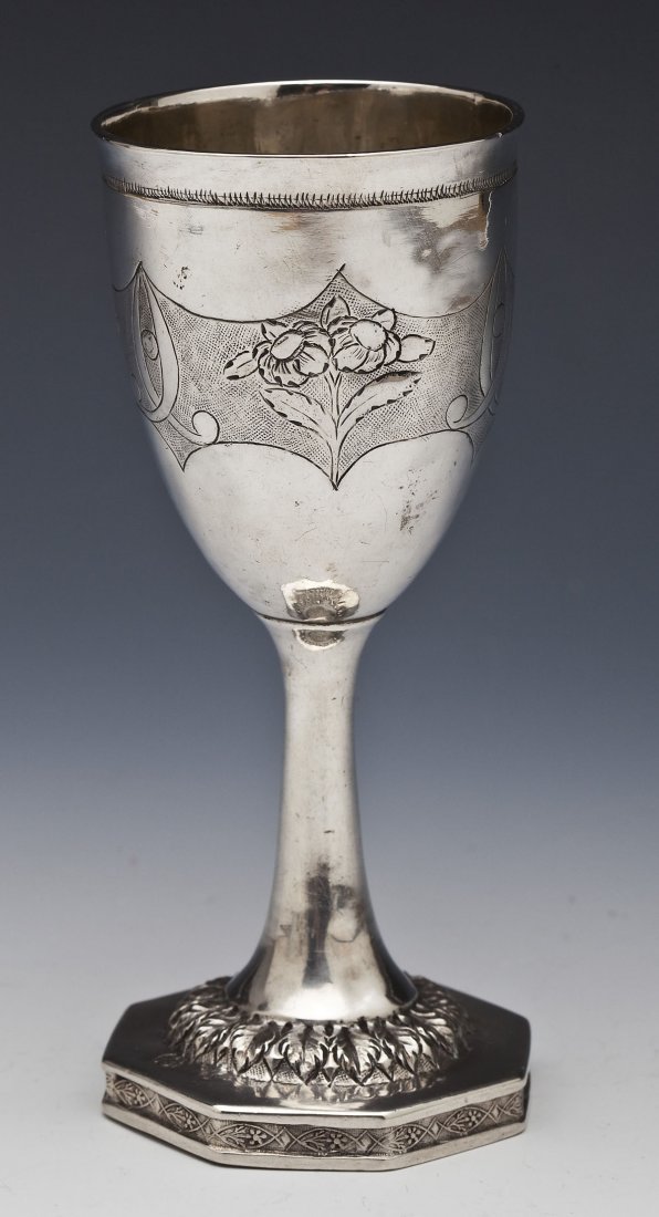 Czechoslovakian Sterling Silver Chalice: DESCRIPTION: Czechoslovakian sterling silver chalice. Etched with floral motif around bowl with leaf motif around base of stem. Marked "MK" on bowl and with country marks around base of stem. MEASUREM