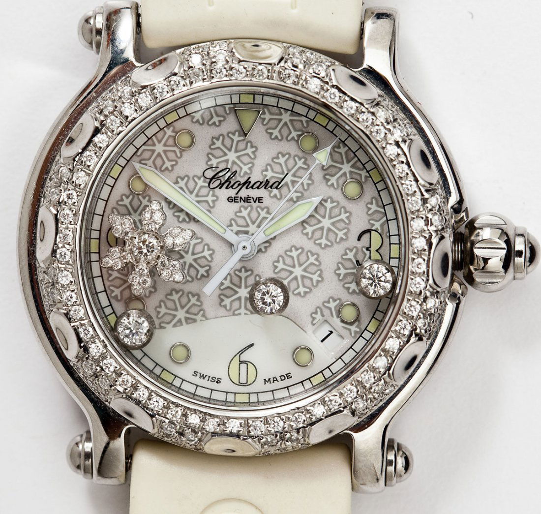 Chopard Happy Sport Wristwatch: DESCRIPTION: Chopard Happy Sport wristwatch. White snowflake dial with .39 ctw of diamonds to bezel and inside, illuminated hands and numerals, sweep seconds, date window between "4" and "5". Stainles