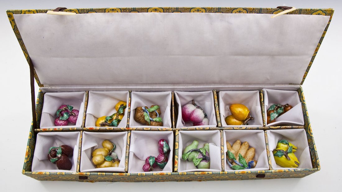 12 Miniature Porcelain Fruits & Vegetables: DESCRIPTION: Twelve pieces miniature porcelain fruits, vegetables, and nuts. Includes: Strawberries, lemons, pumpkins, walnuts, zucchini blossom, squash and more. Housed in fabric-covered case, Asian 