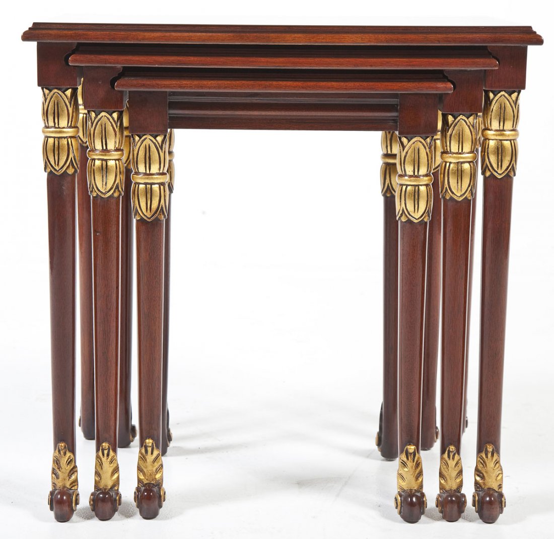 Karges French Neoclassical Revival Style Tables: DESCRIPTION: A walnut and gilded French Neoclassical Revival style nesting table. The form consisting of three graduated identical tables each of walnut with French scroll feet rising to anthemion cap