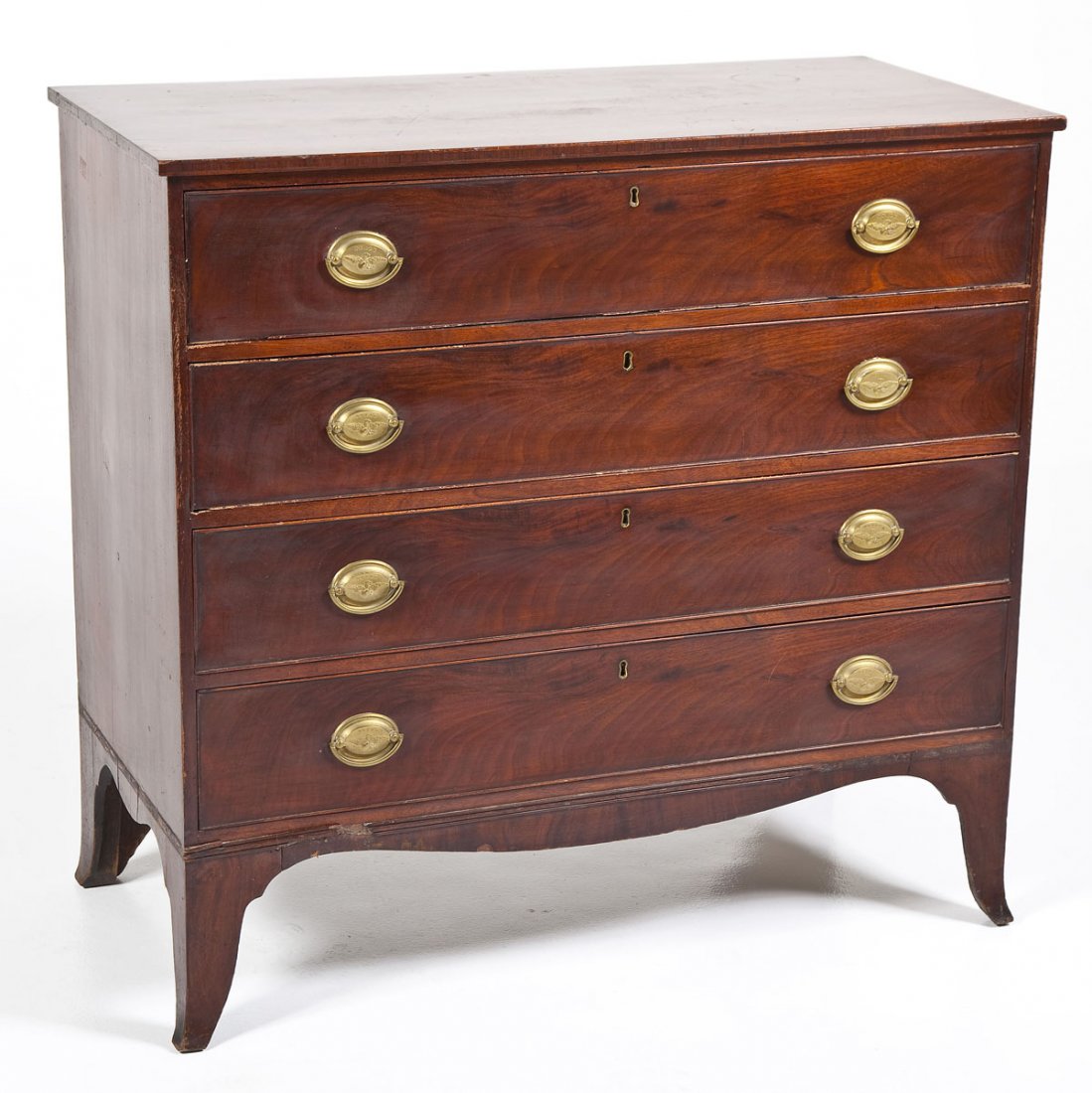 Hepplewhite Low Chest of Drawers: DESCRIPTION: A mahogany (primary) low chest of drawers in the Hepplewhite style. American, probably 1790-1800. The form consisting of a straight-sided chest with four conforming drawers all resting on