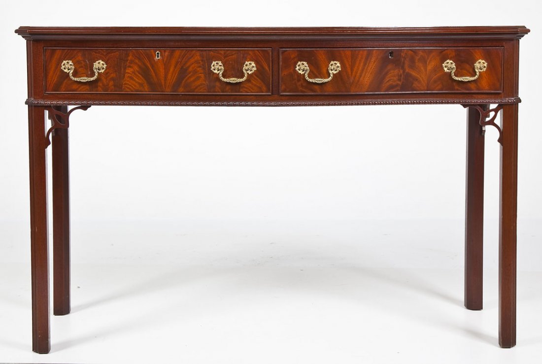 Chippendale Style Side Table: DESCRIPTION: A Chippendale style side table in the Gothic manner made and retailed by Councill as marked. The form consisting of four squared legs joining a rectangular case having two drawers with co