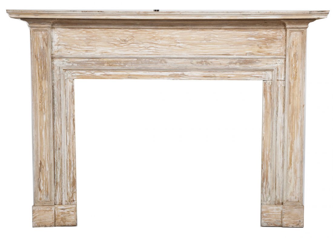 Mantle and Surround: DESCRIPTION: A 19th century painted softwood mantle and surround in the classical taste, probably Pennsylvania. MEASUREMENTS: 5-1/2" x 63-1/2" x 45". CONDITION: Scraped and sanded of older white paint