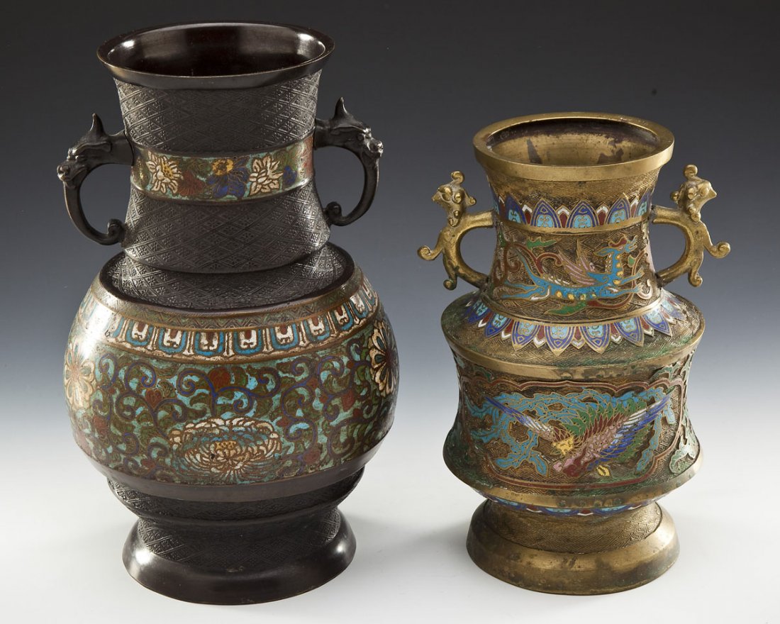 2 Chinese Champleve Vases: DESCRIPTION: Two dual-handled Chinese champleve vases. Includes: 1) Colorful lotus motif with floral and diamond carving. Dragon handles. 14-1/4" high. 2) Gilt bronze with bird and dragon motif and di