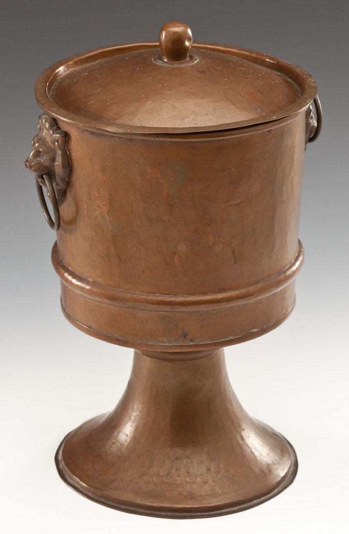 Hammered Copper Russian Ice Bucket: DESCRIPTION: Hammered copper footed ice bucket with lid and lion handles. Made in Tula, indistinguishable maker's mark. Beautiful, even patination. MEASUREMENTS: 12" high with finial x 6-1/2" wide. CO