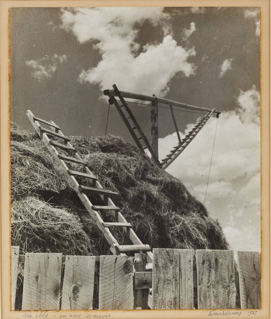 Wright Morris (American, 1910-1998): DESCRIPTION: Wright Morris (American, 1910-1998). Gelatin silver photograph. Pour Jolie - qui aime les nuages. Signed, dated and titled in pencil along lower margin "Wright Morris 1937". Mounted on bo