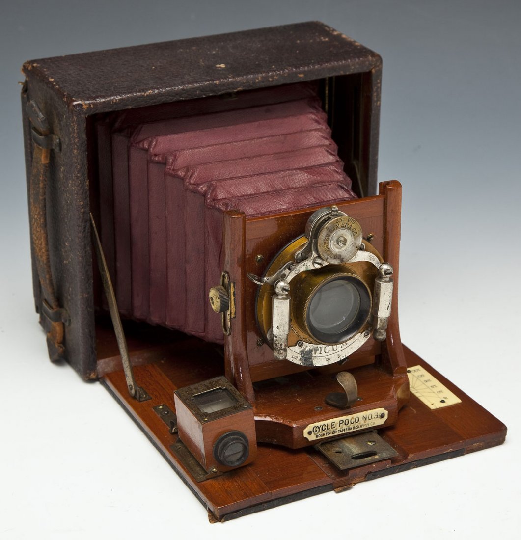 Cycle Poco No. 3 Folding Camera: DESCRIPTION: Cycle Poco No. 3 folding camera, Rochester Camera & Supply Co., New York. Bausch & Lomb lens. Early 20th century. Includes leather case with four plates. MEASUREMENTS: Extended 8-1/2" x 6