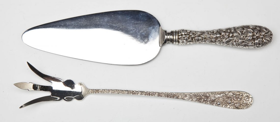 2 Stieff Rose Pattern Serving Utensils: DESCRIPTION: Two Stieff repousse sterling silver serving utensils. Stieff Rose pattern. Includes: one 9-3/4" sterling handled cake server and one 9-1/4" serving fork. MEASUREMENTS: See Description. Ap