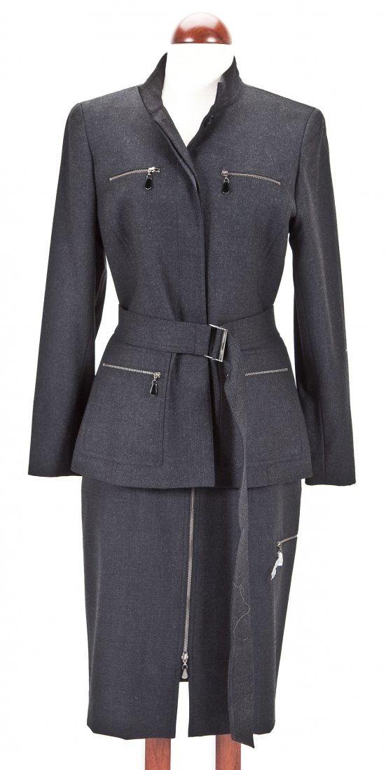 Doncaster 3 Pc Charcoal Wool Suit NWT: DESCRIPTION: Three piece women's charcoal wool suit. Includes jacket with belt, trousers and skirt. New with tags. MEASUREMENTS: Size 8. CONDITION: No defects noted.