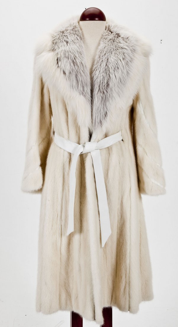 Vintage Leather & White Mink Belted Trench Coat: DESCRIPTION: Vintage white mink trench coat with fox collar and leather trim and belt by Pollack Mink Farm. MEASUREMENTS: 48" long. Sleeve length 24". CONDITION: Fur soft and supple.