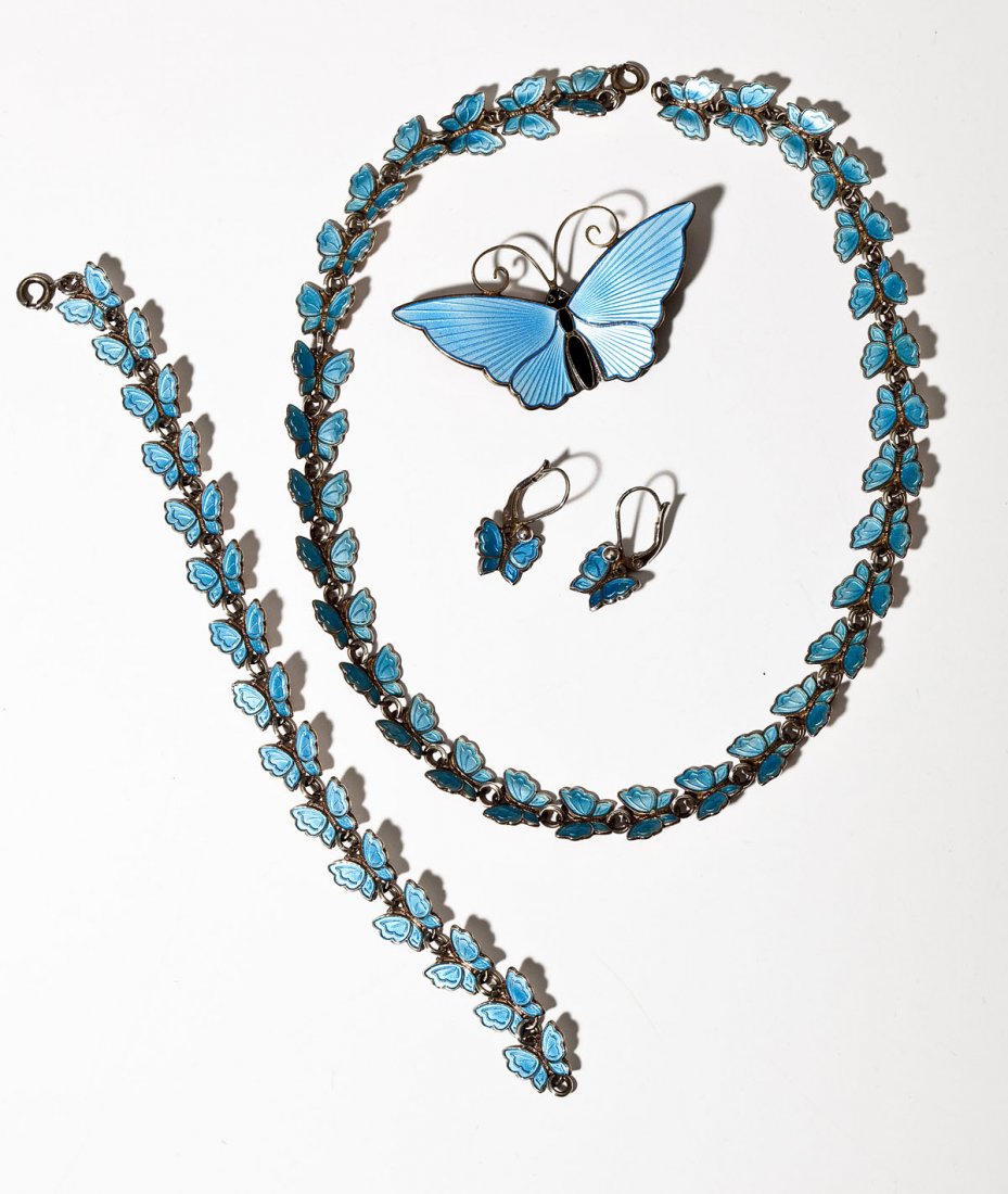 4 Pcs D Andersen & Meka Enameled Sterling Jewelry: DESCRIPTION: Four pieces of blue enameled sterling butterfly jewelry. Includes: 1) 2-1/4" x 1-1/2" David Andersen pin. 2) 14-1/4" Meka necklace. 3) 6-3/4" Meka bracelet. 4) Pair of 1-1/8" Meka earring