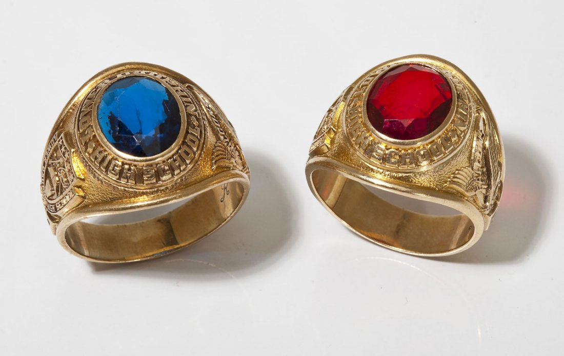 2 10K Lower Dauphin High School Class Rings: DESCRIPTION: Two marked 10K yellow gold Lower Dauphin High School class rings with including 1963 blue and 1962 with red stone. MEASUREMENTS: 1963 size 12. 1962 size 10-1/2. 16.8 dwt (26.1 gr). CONDIT
